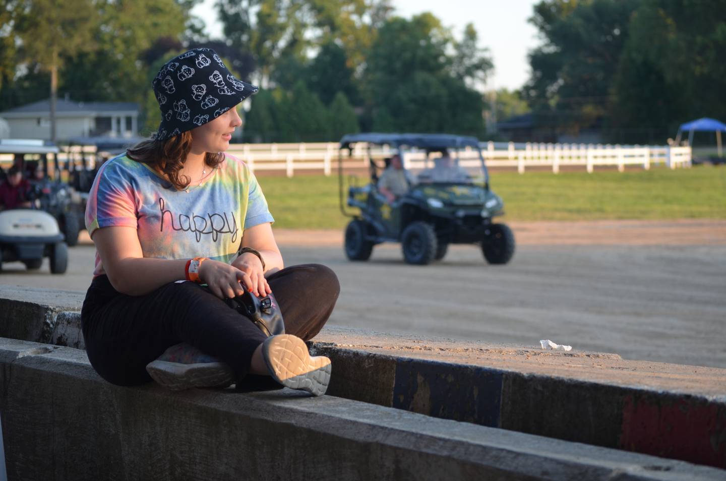 Zuri Finnicum, 12, of Morrison, sings along while listening to Karen as Dolly on Thursday, Aug. 18 at the Whiteside County Fair in Morrison.