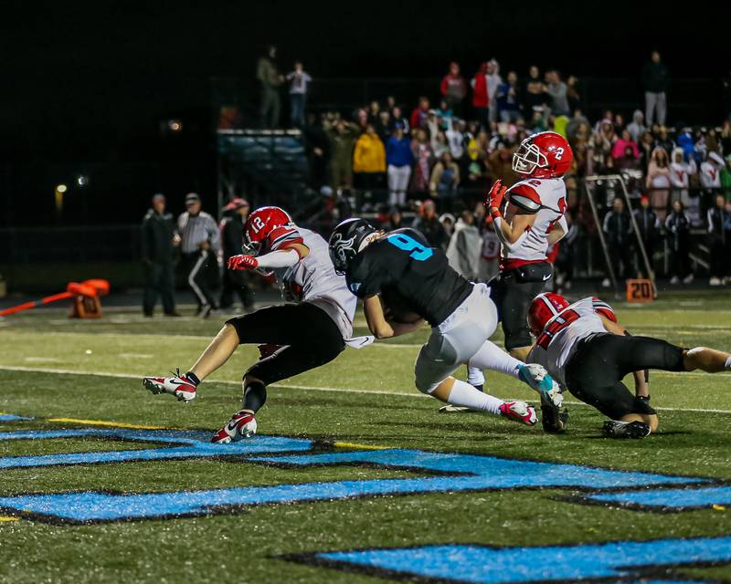 Willowbrook's Carter Ferguson (9) bowls into the endzone after a catch during Class 7A football playoff game between Yorkville at Willowbrook.   Oct 27, 2023.
