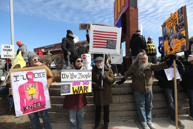Protesters line State Route 31 near the intersection of McCullom Lake Road in McHenry to protest their discontent with President Donald Trump and his administration's policies on Saturday, March 28, 2026, during the McHenry County No Kings Protest. According to an organizer, over 4,000, people took part in the protest.