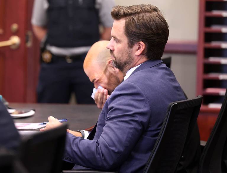 Nathan P. Sweeney, (left) 45, of DeKalb, becomes emotional behind his attorney John Kopp Thursday, June 26, 2025, as lead prosecutor Scott Schwertley recounts the details of the 2024 crash during his plea hearing at the DeKalb County Courthouse in Sycamore. Sweeney pleaded guilty Thursday for driving under the influence on March 28, 2024, and causing a crash that killed DeKalb County sheriff‘s deputy Christina Musil.