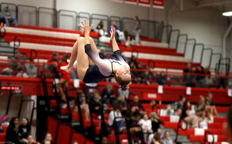 Oswego Co-op’s Sam Phillip competes on the balance beam during the Hinsdale Central Sectional on Monday, Feb. 10, 2025 in Hinsdale.