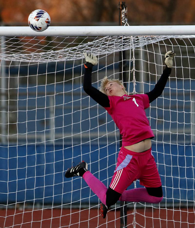Prairie Ridge's Christopher Zinevich blocks a shot on goal during an IHSA Class 2A state semifinal soccer match against Chicago De La Salle on Friday, Nov. 8, 2024, at Hoffman Estates High School.