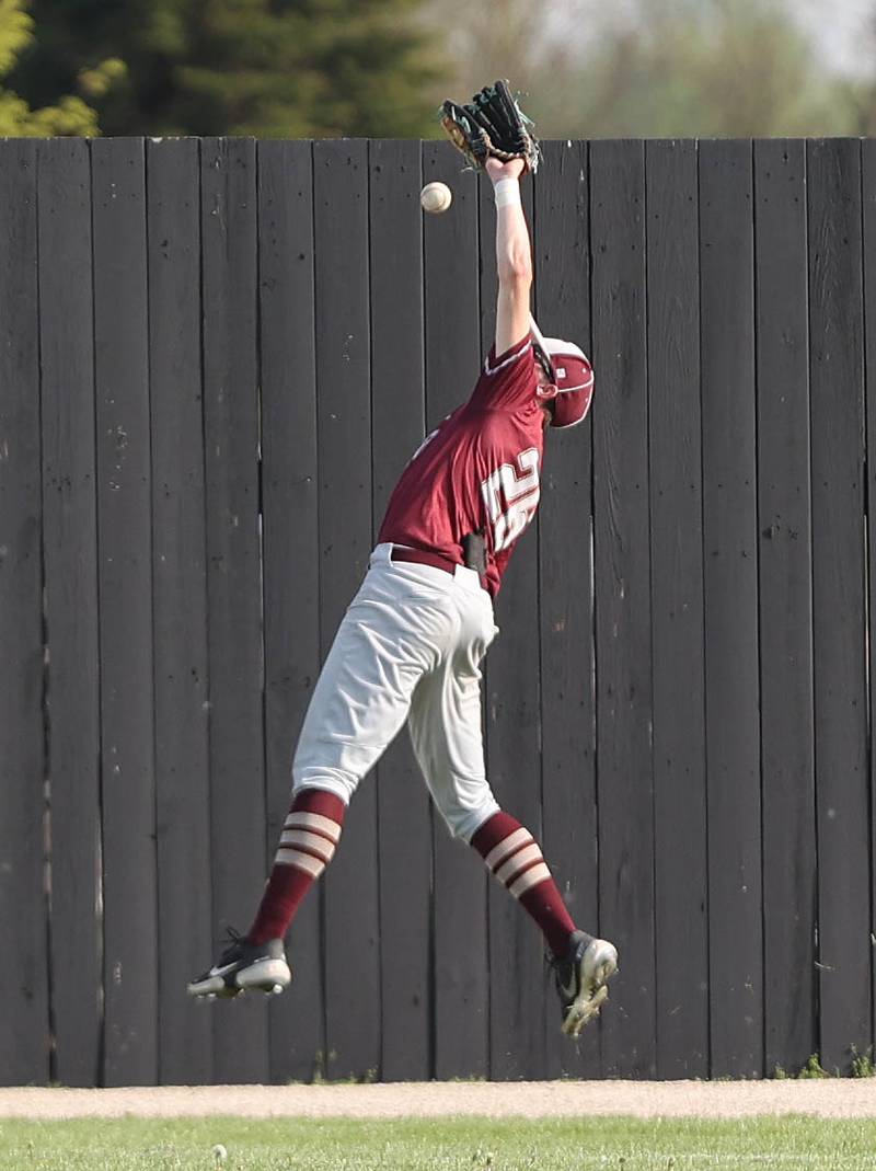 Morris' Brett Bounds can’t quite make a leaping catch during their game against Sycamore Tuesday, May 9, 2023, at the Sycamore Community Sports Complex.