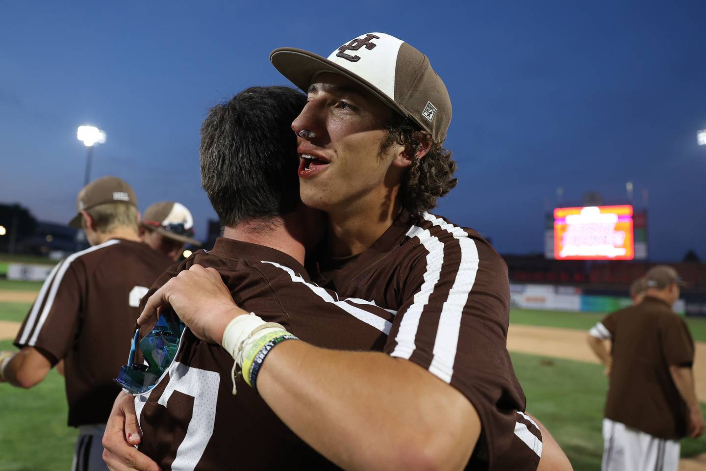 Joliet Catholic’s Jake Troyner hugs Jake Gimbel after the win against Columbia in the IHSA Class 2A State Championship on Saturday, June 3, 2023 in Peoria.