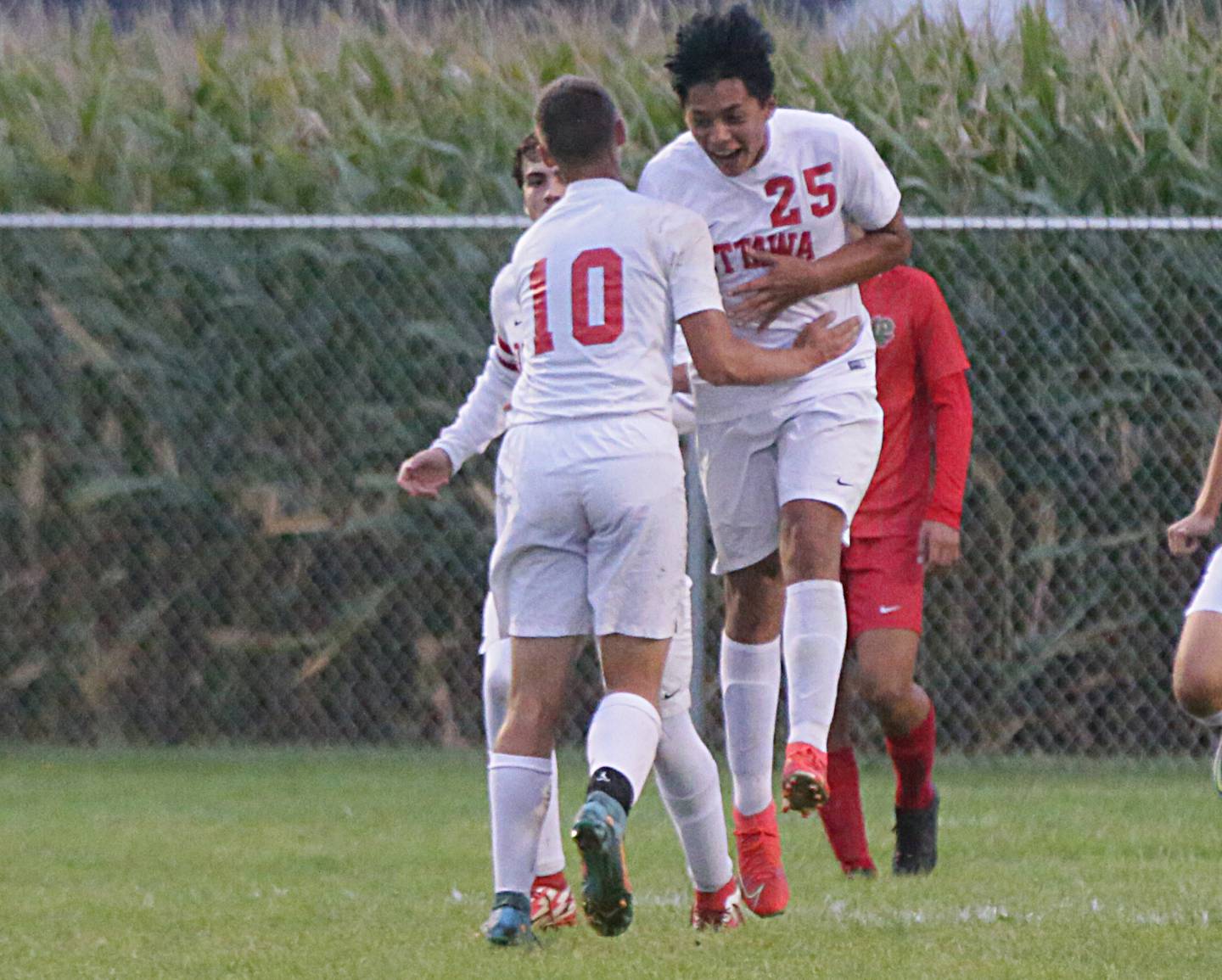 Ottawa's Jorge Lopez (25) celebrates with teammate Brian Diederich (10) after scoring a goal against La Salle-Peru on Monday, Sept. 12, 2022 at the L-P Sports Complex in La Salle.