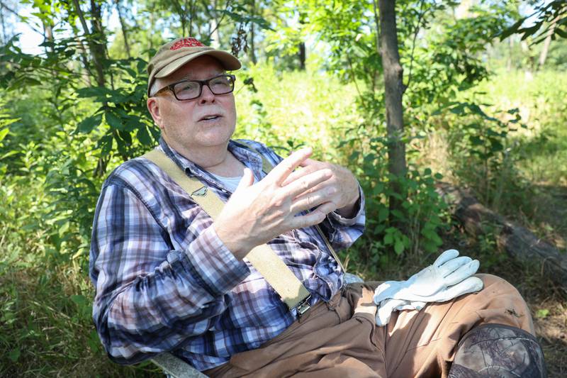Volunteer Steve Bohan, of Altorf, talks about the importance of the conservation work on Langham Island during a Friends of Langham Island stewardship day on Aug. 9, 2025.