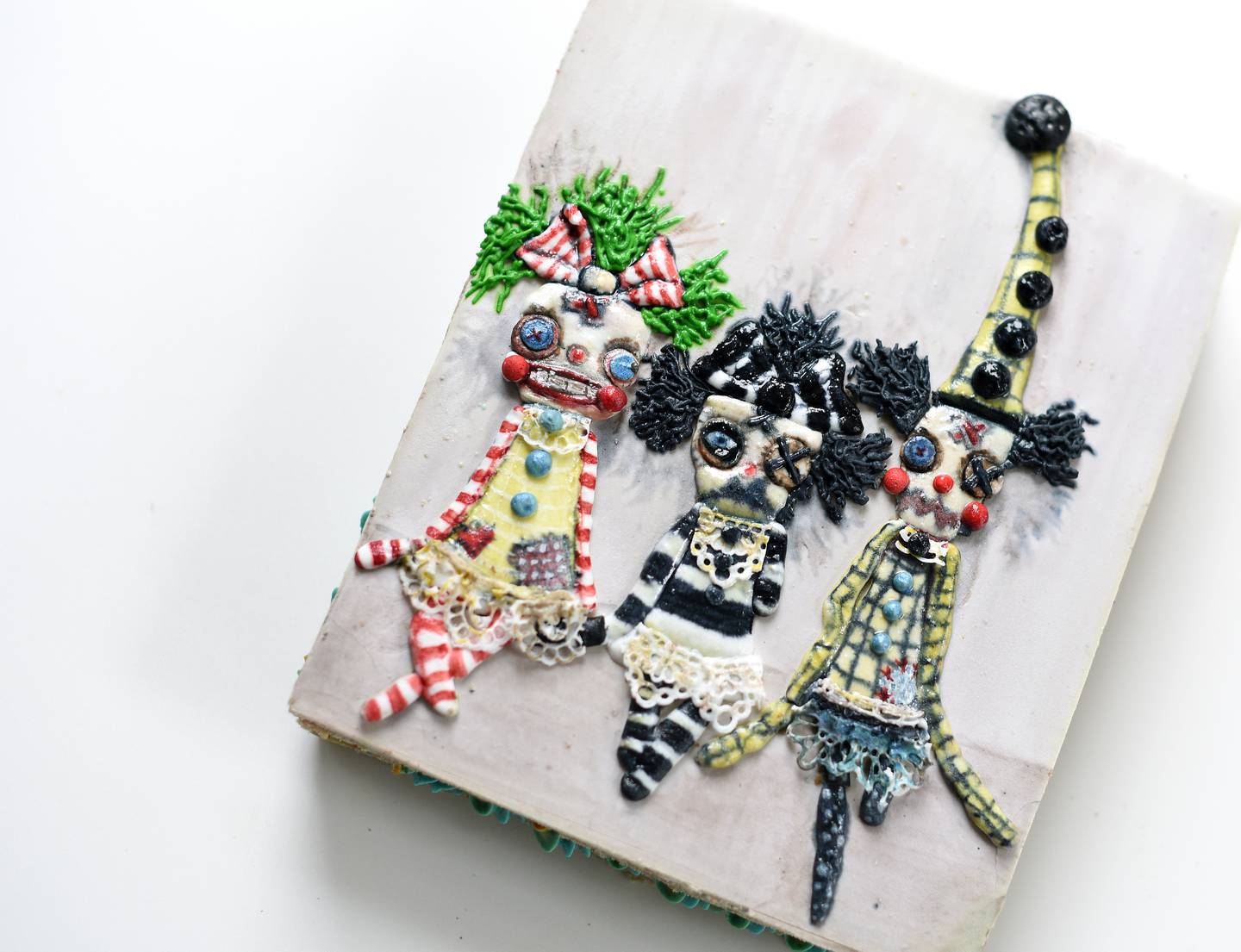 Liz Suwanski got the inspiration for this cookie design from an artist she saw online who made creepy dolls. After getting the artist's approval she designed the cookie.