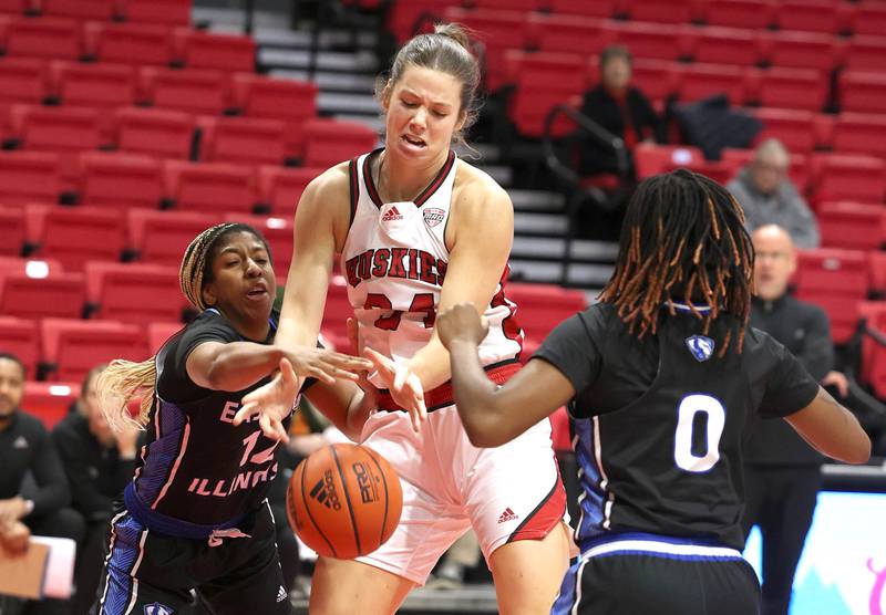 Northern Illinois' Brooke Stonebraker and Eastern Illinois' Charita Lewis go after a loose ball during their game Monday, Dec. 18, 2023, at the Convocation Center at NIU in DeKalb.
