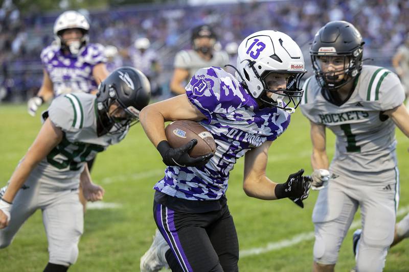 Dixon’s Kellen Haenitsch picks up yards against Rock Falls Friday, Sept. 12, 2025, during Dixon’s home opener.