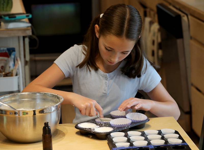 Tenlee Pedersen with some of the bath bombs she makes to sell on Thursday, July 31, 205, and her home near Union. She is one of several young entrepreneurs who will be taking part in a junior market will launch for the first time at the Huntley Farmers Market.