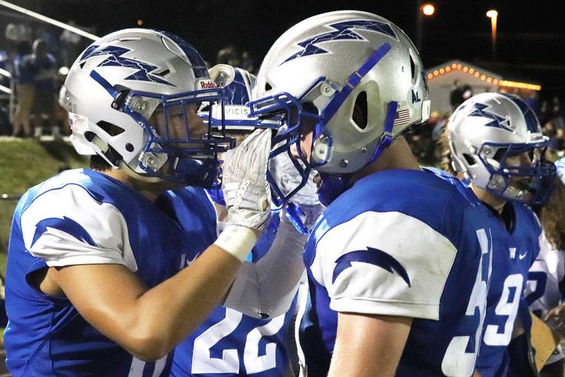Woodstock's Gavin Loiselle, left, celebrates with Nate Hastings during Friday's win over Ottawa in Woodstock.