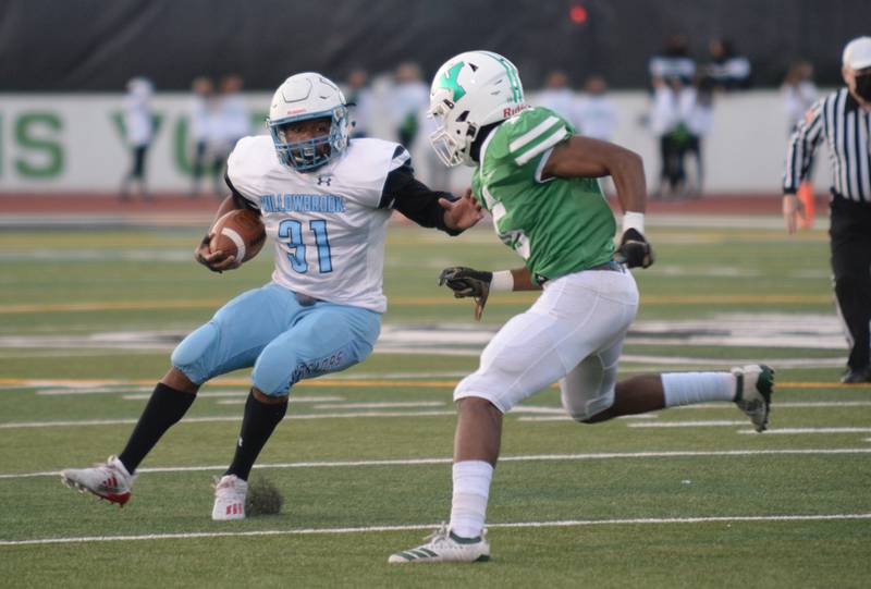 Willowbrook's  Josh Brown makes his way past York's Jalon Jones during their game April 9. The game was tied 14/14 at the half.