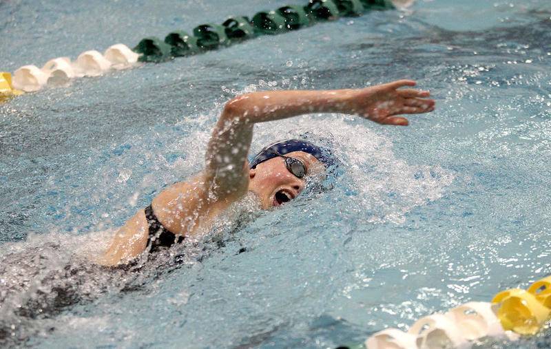 Corinne Guist of Oswego co-op competes in the 500-yard freestyle during the IHSA Girls Swimming and Diving preliminaries in a previous season at New Trier High School.