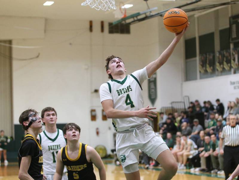 St. Bede's Gino Ferrari runs in the lane to score on a layup against Ashton-Franklin Center during the Class 1A Regional quarterfinal game on Monday, Feb. 24, 2025 at St. Bede Academy.