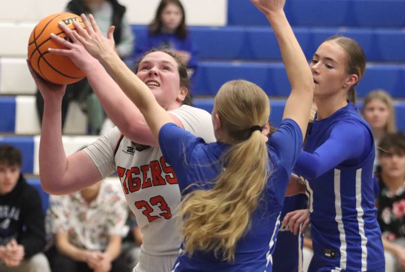 Crystal Lake Central’s Leah Spychala works under the hoop in IHSA Class 3A Regional Title Game girls basketball action on Thursday, Feb. 20, 2025, at  Central High School in Burlington.
