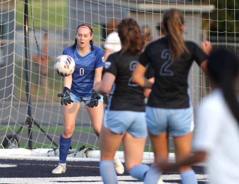 St. Charles North goalkeeper Kara Claussner grabs the ball during a Class 3A West Chicago Sectional against Geneva on Tuesday, May 23, 2023.