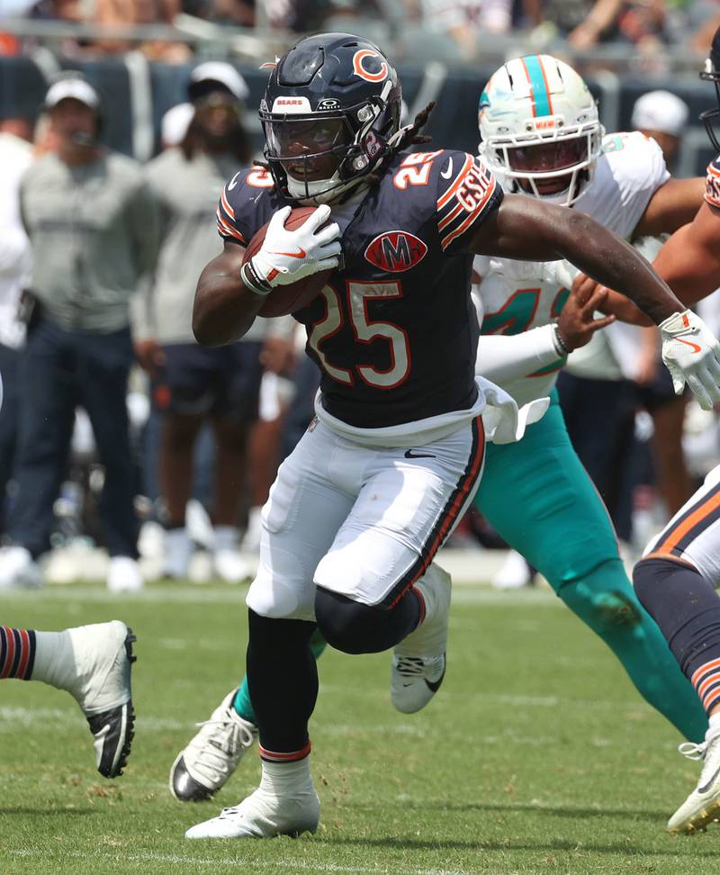 Chicago Bears running back Kyle Monangai finds some room to run in the Miami Dolphins defense Sunday, Aug. 10, 2025, during their preseason game at Soldier Field in Chicago.