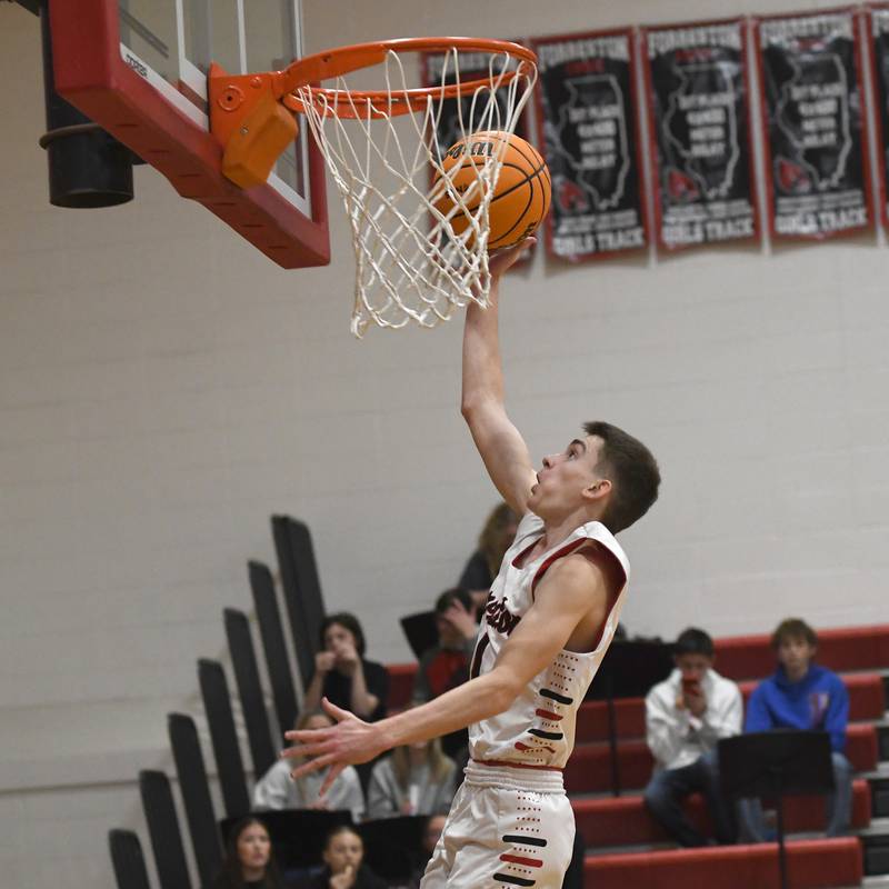 Forreston's Brady Gill drives in for two points against AFC on Saturday, Jan. 17, 2026 at Forreston High School.