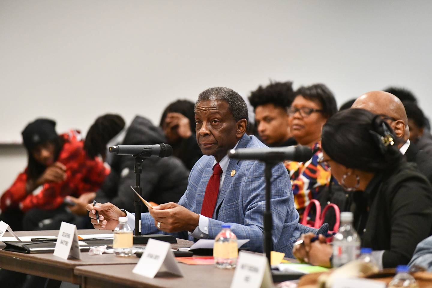 Theodis Pace, president of the Kankakee County Branch of the NAACP, asks a question to Kankakee Mayor Chris Curtis and Democratic mayoral candidate Genevra Walters during the NAACP's Candidates Forum on Tuesday, March 11, 2025, at Kankakee Community College.