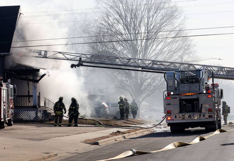Firefighters work the scene of a fully engulfed house fire in the 800 block of Bucklin Street on Friday, Jan. 23, 2026 in La Salle.