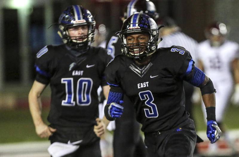 East's A.J. Henning celebrates after scoring a touchdown Saturday, Nov. 25, 2017, during the IHSA Class 8A Football State Finals at Northern Illinois University in Dekalb, Ill. The Griffins defeated the Ramblers, 23-14.