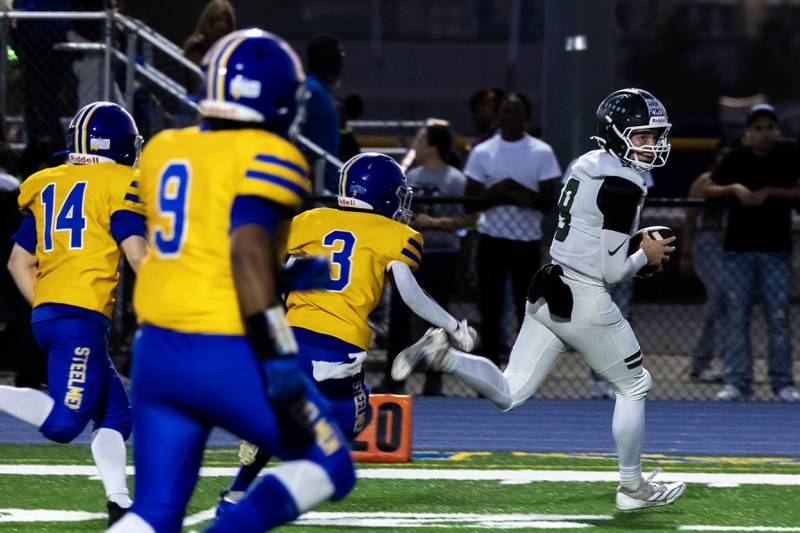 Plainfield Central's Tommy Morrisette runs the ball for a touchdown during a varsity football away game against Joliet Central on Sept. 26, 2025.