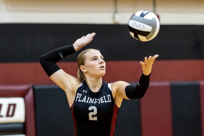 Plainfield North's Claudia Los serves against Morris during a varsity volleyball home game on Sept. 2, 2025.