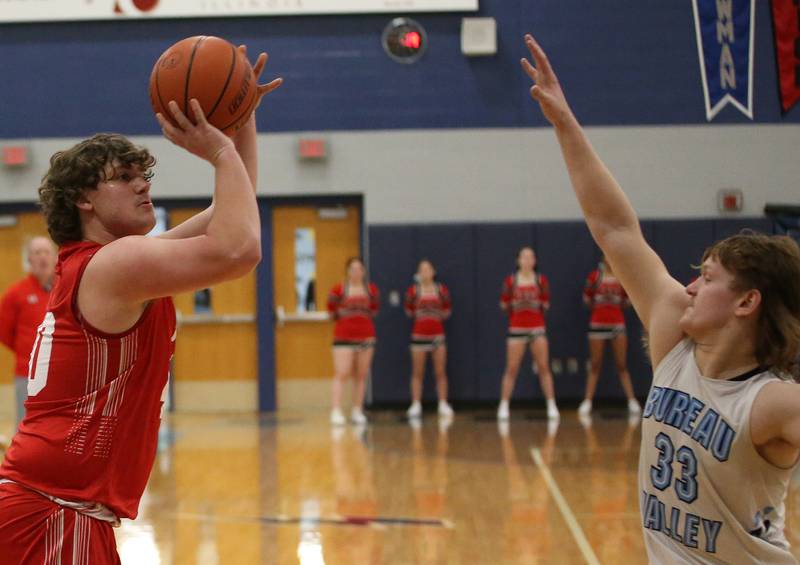 Hall's Payton Dye shoots a jump shot over Bureau Valley's Elijah Endress on Friday, Jan. 19, 2024 at Bureau Valley High School.