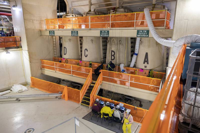 Below the turbine room, contractors work on equipment Wednesday, April 16, 2025, at the Byron station.