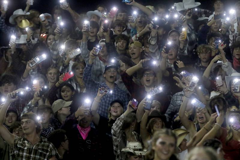 Prairie Ridge fans celebrate their 21-20 win over Cary-Grove in a Fox Valley Conference football game on Friday, Sept. 22, 2023, at Cary-Grove High School in Cary.
