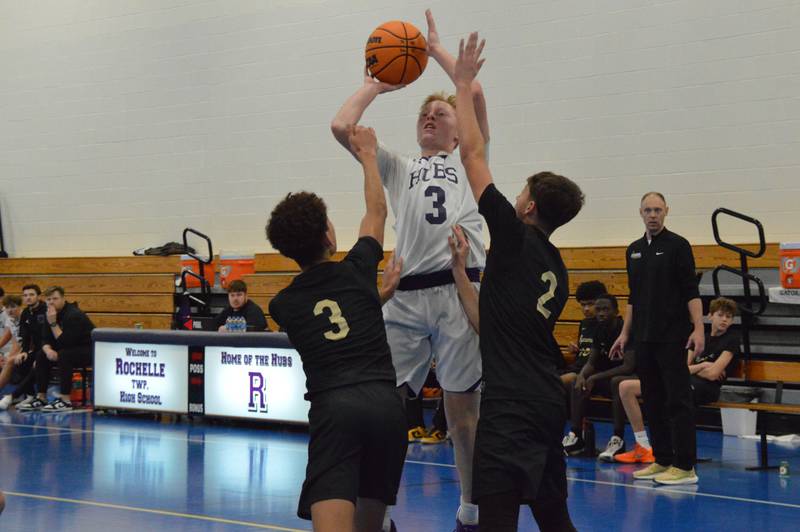 Rochelle's Luke Chadwick puts up a shot during the Hubs' sophomore basketball game with Sycamore. Chadwick scored five points in the game.