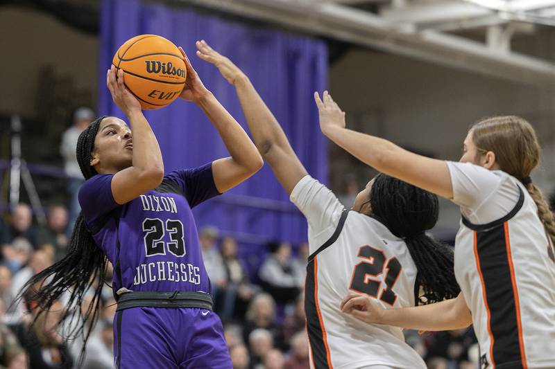 Dixon's Ahmyrie McGowan puts up a shot against Byron Friday, Dec. 27, 2024, during the Dixon Girls KSB Holiday Basketball Classic.