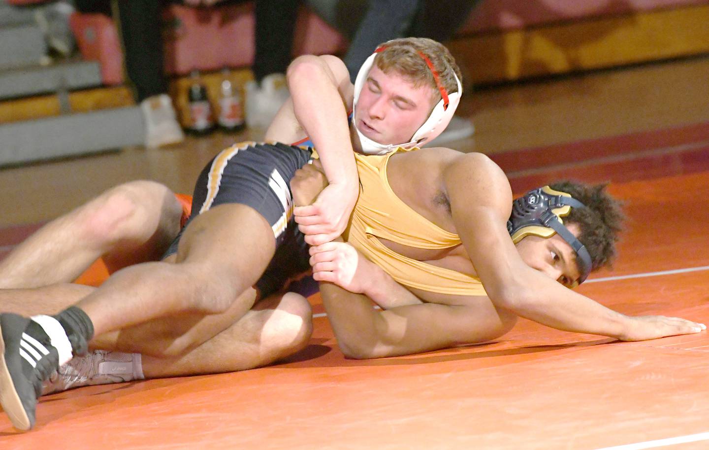 Oregon's Gabe Eckerd wrestles Polo's Tristan Green on Dec. 2 at the Blackhawk Center in Oregon.
