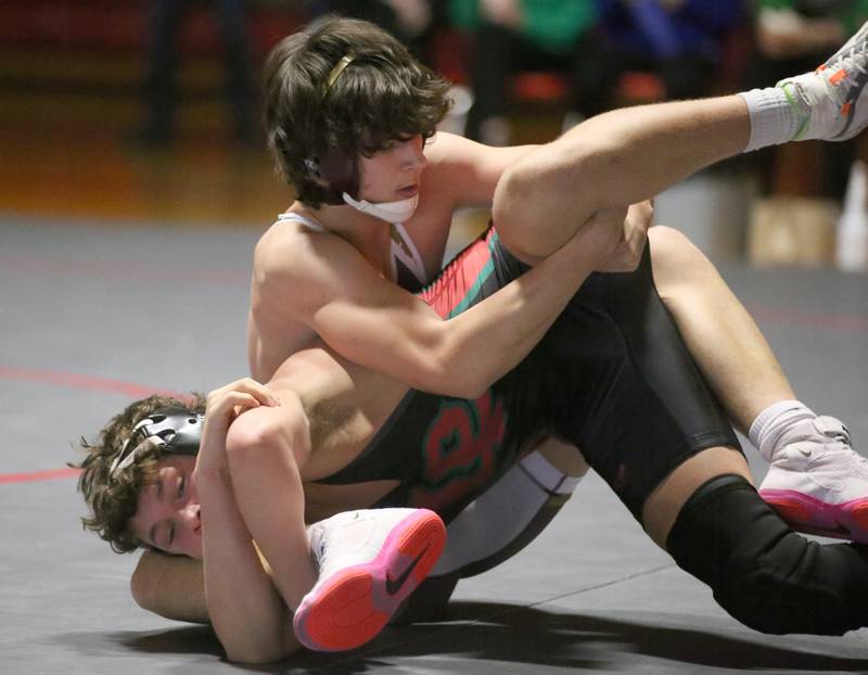 Morris's Kacden Klinker wrestles L-P's Rylynd Rynkewicz on Thursday, Jan. 11 2024 in  Sellett Gymnasium.