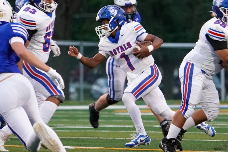 Larkin’s Julius Yandell Jr (1) runs the ball on a keeper against Geneva during a football game at Geneva High School on Friday, Aug 30, 2024.