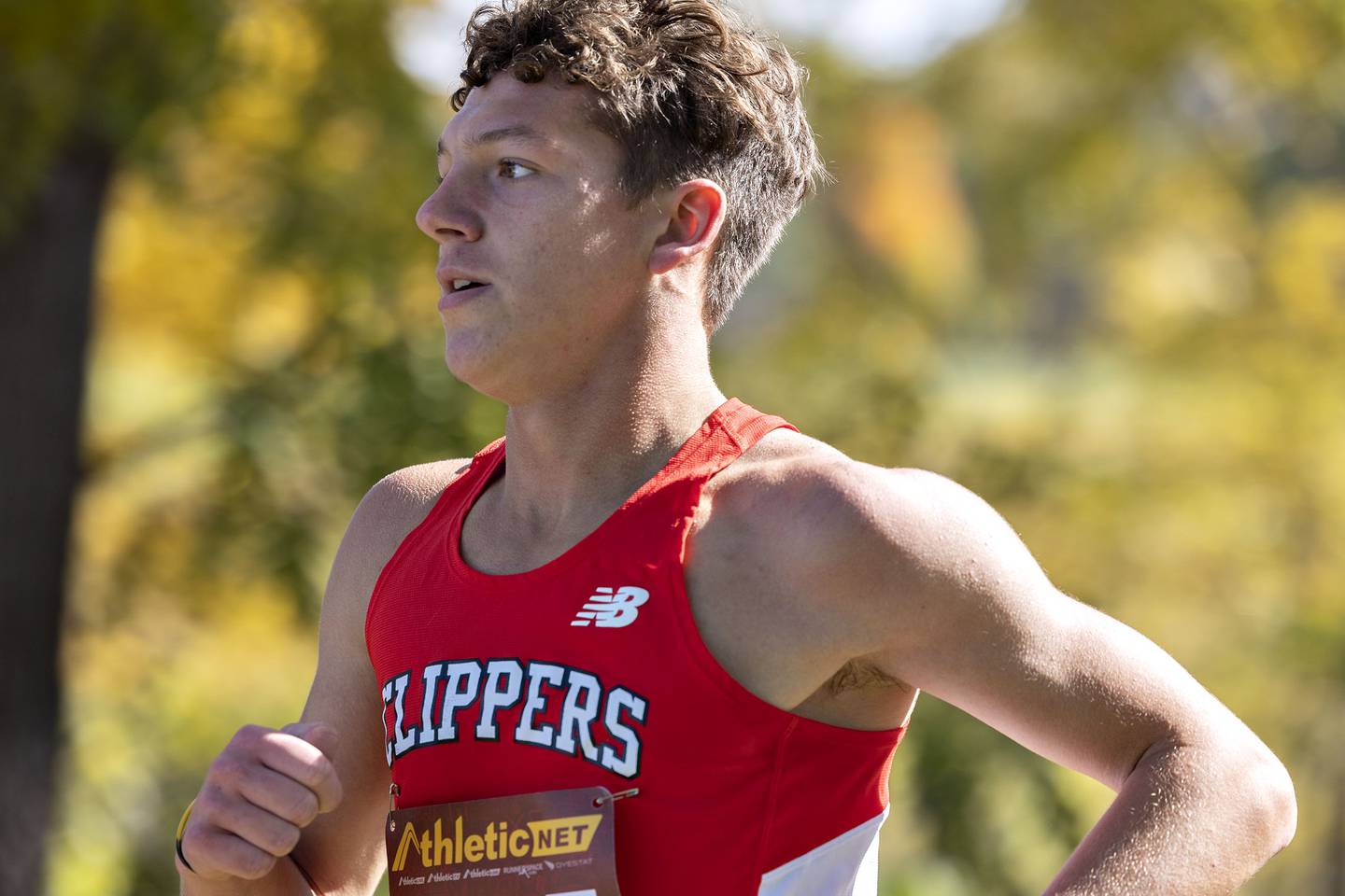 Amboy’s Kyler McNinch takes 15th during the boys varsity race at the Amboy Columbus Day Invitational Monday, Oct. 10, 2022.