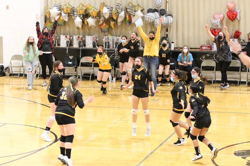 The Putnam County 8th grade girls are excited to put away a 25-19, 25-11, 25-23 over Ottawa Marquette on Senior Night.