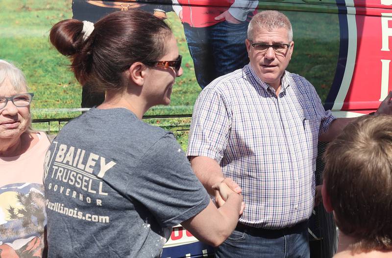 Darren Bailey, a Republican candidate for Illinois governor, greets supporters Friday, June 17, 2022, during his campaign stop at Tom and Jerry's in Sycamore. Bailey is currently on a bus tour across the state that will cover 102 countys in 14 days.