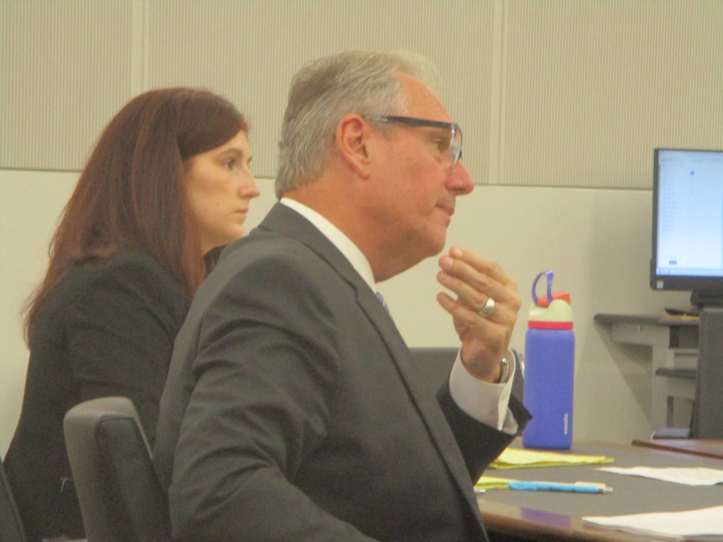 Frank Andreano and Anna Bertani, attorneys for Joliet Councilman Juan Moreno, listen during a court hearing on Monday in a case that will determine whether Moreno remains on the City Council. Sept. 22, 2025
