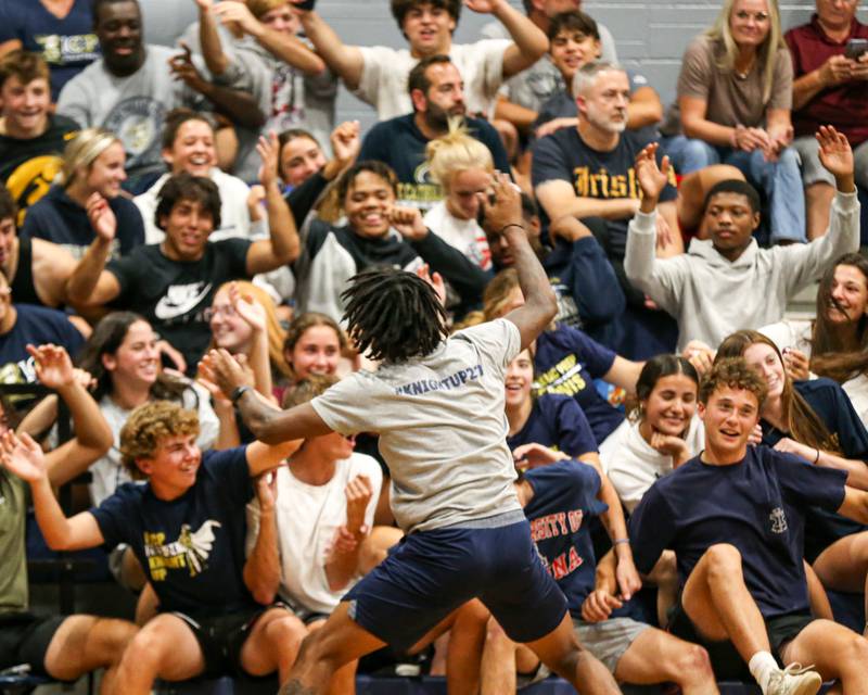 The IC Catholic Prep student section cheers during volleyball match between Nazareth at IC Catholic Prep.  Aug 29, 2023.