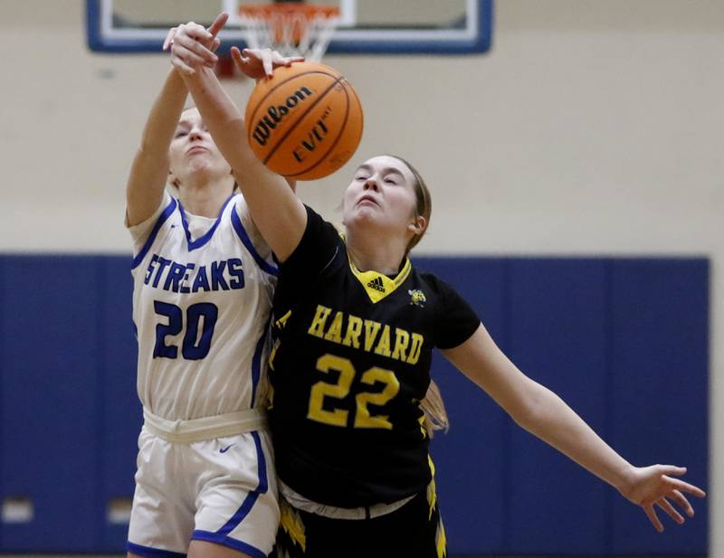 Woodstock's Kendall O'Dea tries to steal an inbound pass to Harvard's Summer Jones during a Kishwaukee River Conference girls basketball game on Monday Jan. 12, 2026, at Woodstock High School.