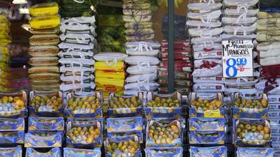 Inflation rose slightly last month as grocery prices ticked higher