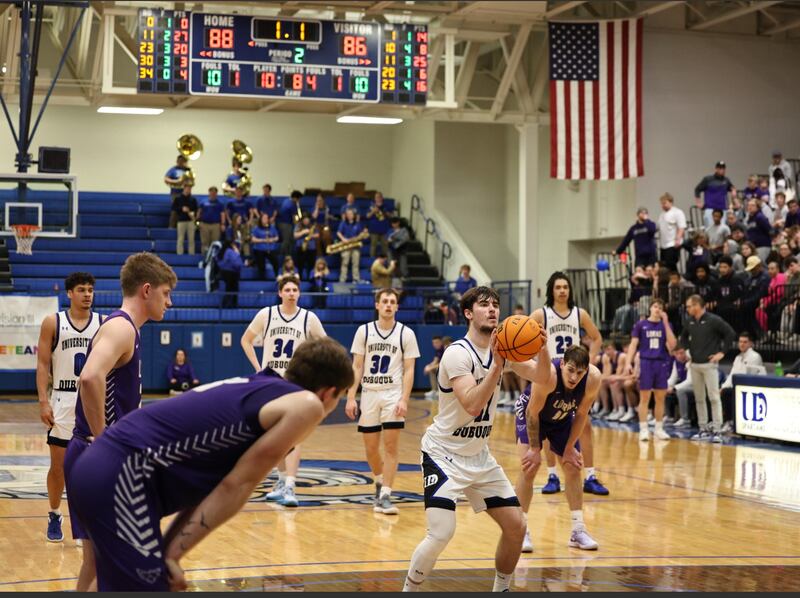 University of Dubuque's Grady Thompson scored a game-high 29 points, including this free throw to seal the Spartans' 90-86 double overtime win over crosstown rival Loras College on Feb. 22.