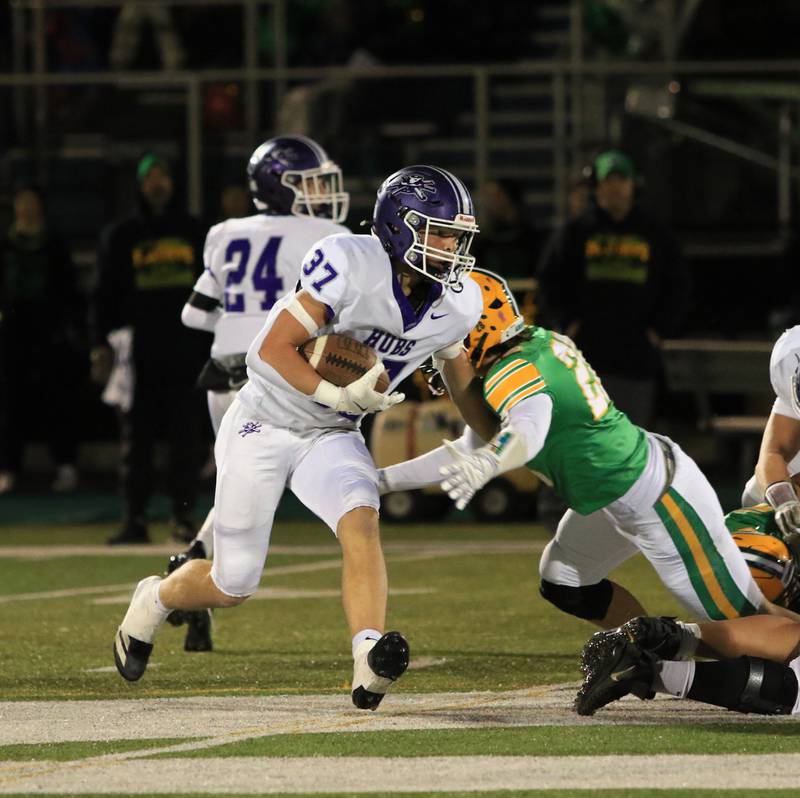 Rochelle's Jonathan Andrist (37) runs the ball during Friday's game at Geneseo.