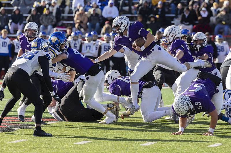 Wilmington's Ryan Kettman leaps over the pike against Maroa-Forsyth Friday, Nov. 28, 2025, in the Class 2A football finals at Hancock Stadium at ISU.