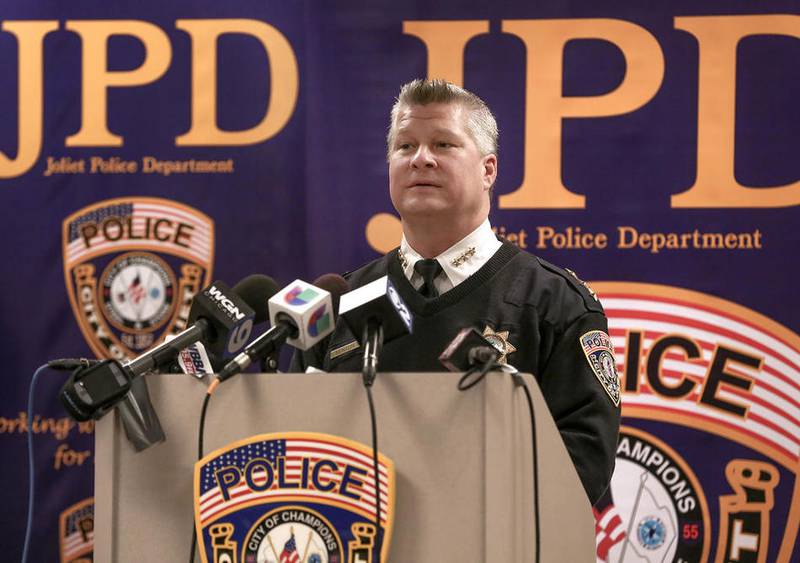 Joliet Police Chief Brian Benton address the media Wednesday, Feb. 24, announcing the arrest of nearly 20 Latin Kings gang members during a press conference in Joliet.