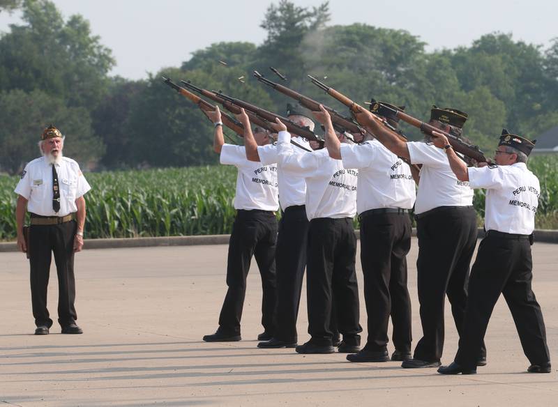 Peru Veterans Memorial Group Veterans fire a 21 gun salute during the Flag Retirement Ceremony on Wednesday, June 14, 2023 at Veterans Park in Peru. Each year on Flag Day, the group retires flags while holding a ceremony with Boy Scout Troop 123 and Cub Scout 3709 from Peru.