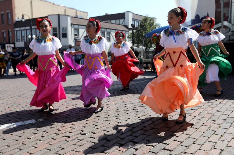 Dancers from Ballet Folkloric Erandi perform on Sunday, Sept. 14, 2025, during the annual Hispanic Connections Mexican Independence Day Celebration in the Historic Woodstock Square. The celebration featured music, food and culture.