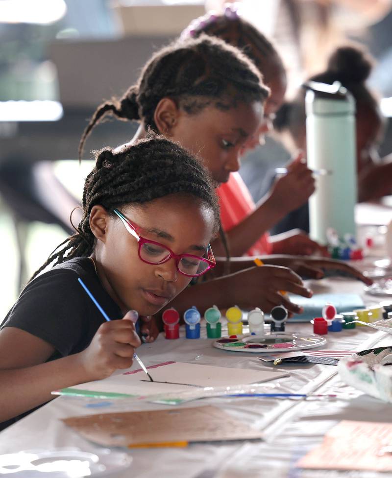Participants do some watercolors during Fun Jam in the Park Tuesday, June 27, 2023, at Welsh Park in DeKalb. Fun Jam in the Park offers constructive activities for kids on Tuesday and Thursday through August 8th from 5-7 p.m. at various parks in DeKalb.
