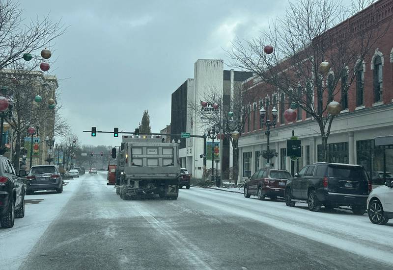 A snow plow travels south on La Salle Street on Monday, Dec. 2, 2024 downtown Ottawa.